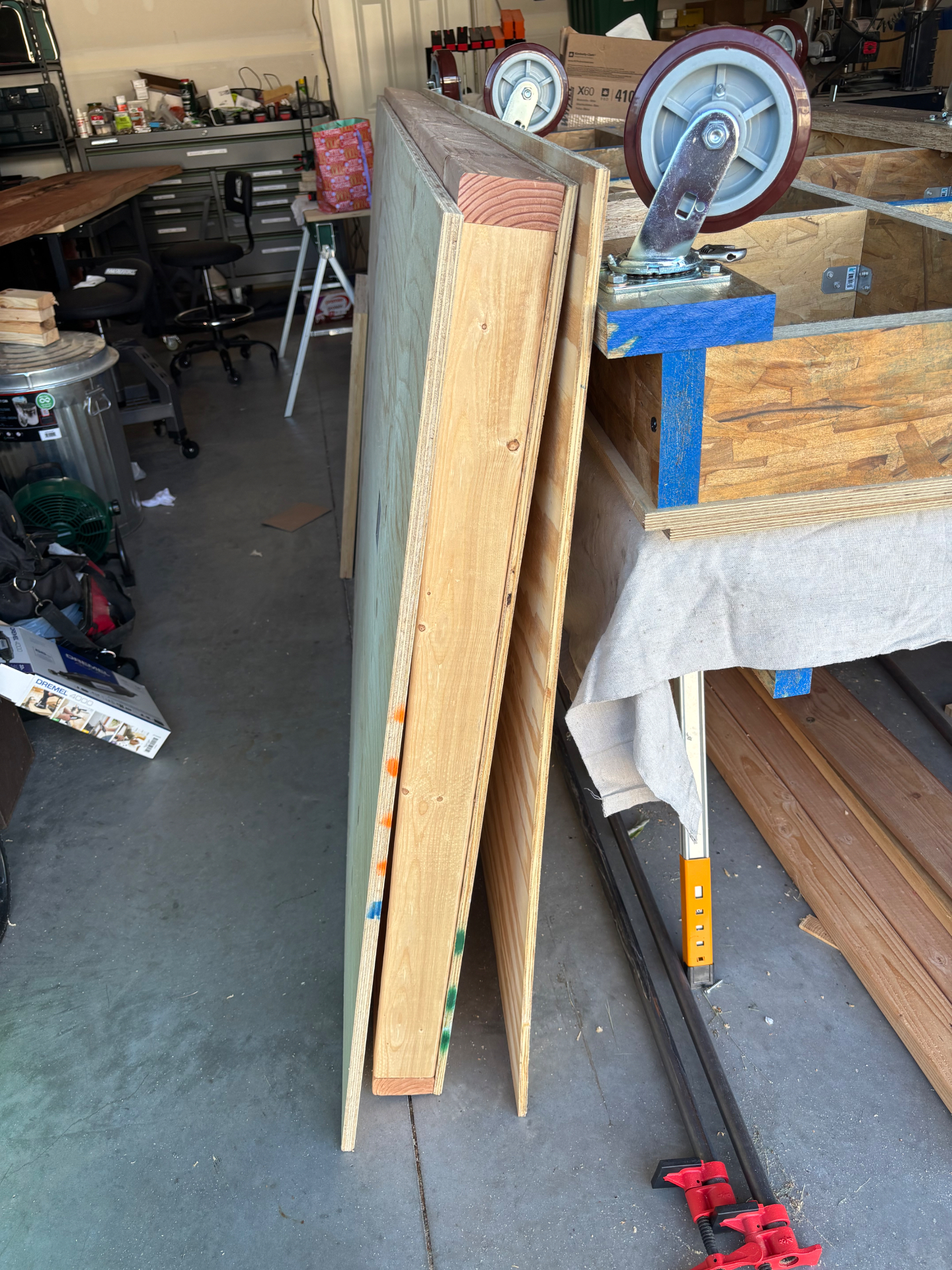 Center wall framing with its first plywood skin
